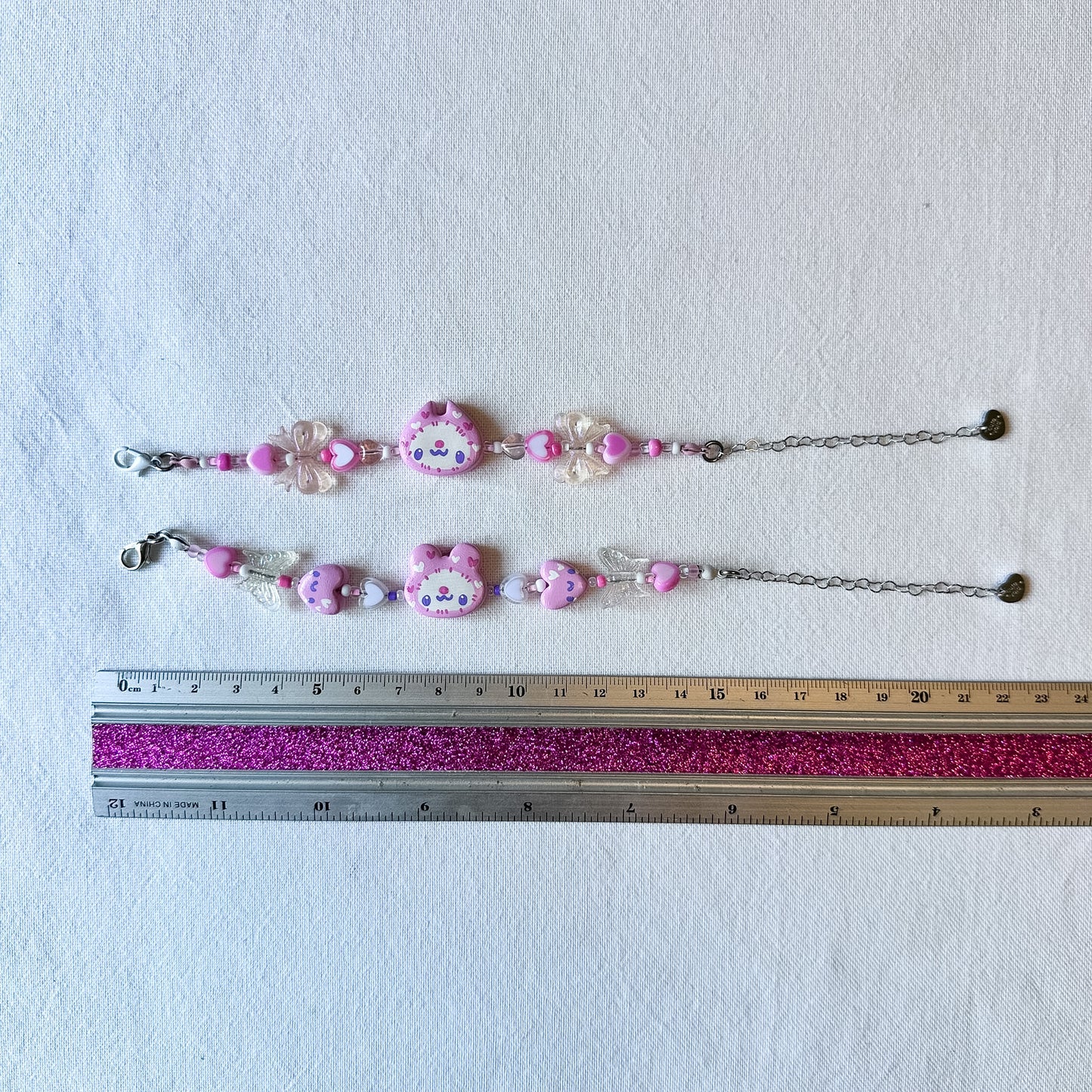 Pink Hat Clay Bracelets